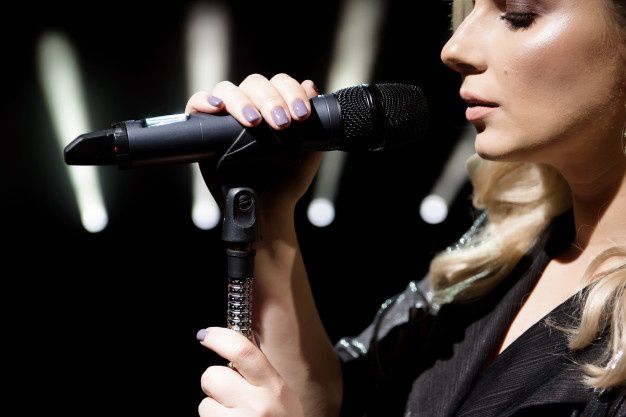 microphone female singer close up woman singing into microphone 104603 1027